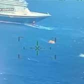 Disney cruise ship comes to the rescue of a sinking boat.
