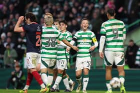 Callum McGregor of Celtic celebrates scoring his team's fourth goal against Ross County