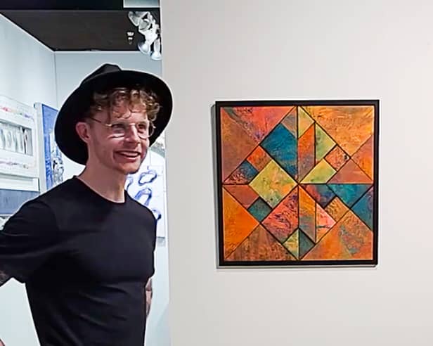Lewis Deeney with his artwork, Awakening II, which is set to be sent to the moon.