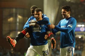 Hamza Igamane of Rangers celebrates with Mohamed Diomande and Ianis Hagi against Kilmarnock