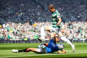 Leon Balogun tries to thwart Daizen Maeda in May's Scottish Cup final.
