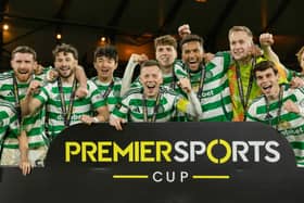 Celtic players celebrate after winning the Premier Sports Cup final