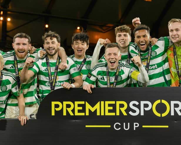 Celtic players celebrate after winning the Premier Sports Cup final