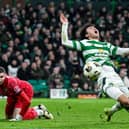 Celtic's Hyun-jun Yang is brought down in the box by Motherwell goalkeeper Aston Oxborough. (Photo by Rob Casey / SNS Group)