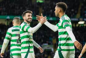 Greg Taylor (left) celebrates with Auston Trusty after Celtic's second goal in the 3-0 win over St Mirren.