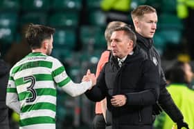 Celtic manager Brendan Rodgers and Greg Taylor after the win over St Mirren.