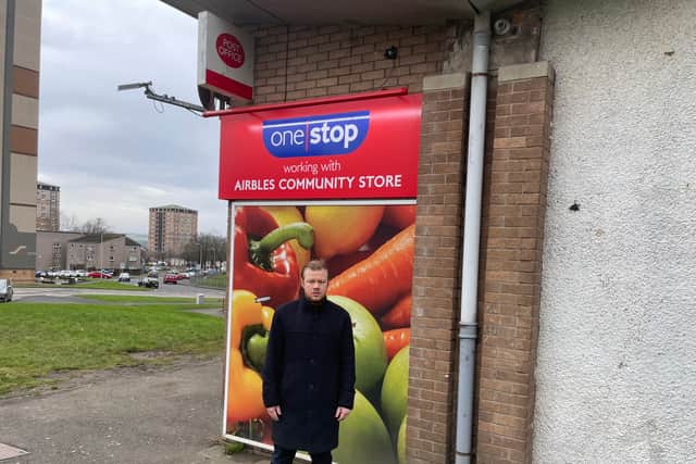 Councillor Nathan Wilson pictured outside of the previous Civic Square branch after the Post Office announced it would close last year