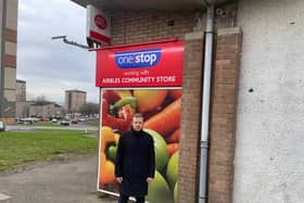 Councillor Nathan Wilson pictured outside of the previous Civic Square branch after the Post Office announced it would close last year