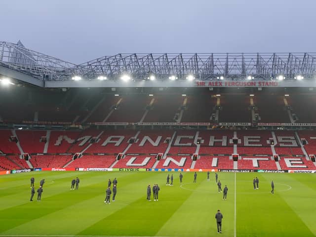 Rangers players inspect the pitch before a press conference at Old Trafford, Manchester. Picture date: Wednesday January 22, 2025.