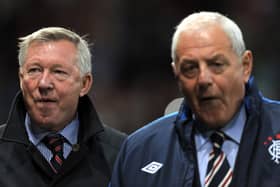 Manchester United manager Sir Alex Ferguson (L) and Rangers' manager Walter Smith in September 2010