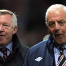 Manchester United manager Sir Alex Ferguson (L) and Rangers' manager Walter Smith in September 2010