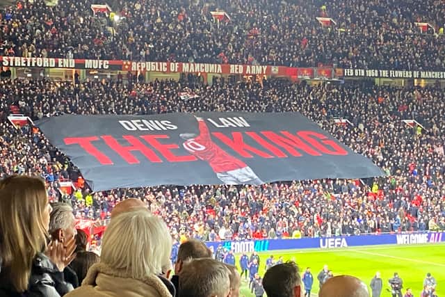 Manchester United fans pay tribute to club legend Denis Law before kick-off vs Rangers by unfurling a banner
