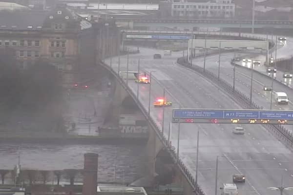 The overturned lorry has caused part of the M8 to be closed