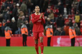 Virgil van Dijk of Liverpool applauds the fans