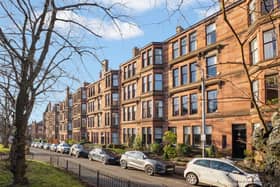 The front of the red sandstone tenement on Lauderdale Gardens in Hyndland. 