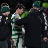 Paulo Bernardo of Celtic leaves the pitch injured against Raith Rovers