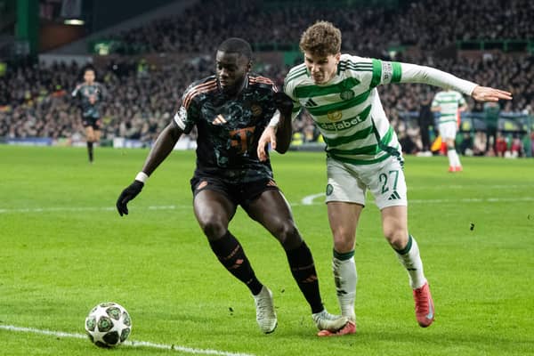 Celtic were denied a penalty despite a VAR check after Bayern's Dayot Upamecano (L) stood on the foot of Arne Engels in the box.
