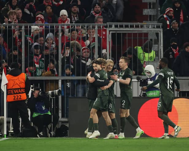 Celtic were eliminated from the Champions League after a hard-fought 1-1 draw with Bayern Munich.