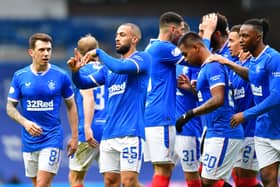 Former Rangers striker Kemar Roofe (centre) has joined English Championship side Derby County on a short-term deal