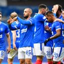 Former Rangers striker Kemar Roofe (centre) has joined English Championship side Derby County on a short-term deal