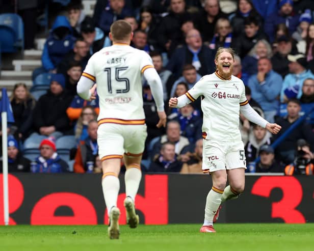 Luke Armstrong of Motherwell celebrates scoring the opening goal during the William Hill Premiership match between Rangers FC and Motherwell FC