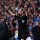 VAR was first introduced in Scottish football  in October 2022 and it's fair to say that very few, if any, football supporters are fans of the technology (Pig: Getty)