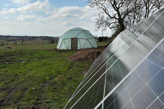 Robyn's solar panels which she installed at the container where she lives in rural Scotland. Photo: Robyn Swan / SWNS