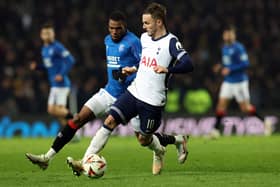 Dujon Sterling of Rangers vies with James Maddison of Tottenham Hotspur during the UEFA Europa League league phase match at Ibrox