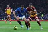 Cyriel Dessers of Rangers FC is challenged by Kofi Balmer of Motherwell