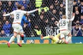 Luke Armstrong of Motherwell scores the opening goal during the William Hill Premiership match between Rangers FC and Motherwell FC 