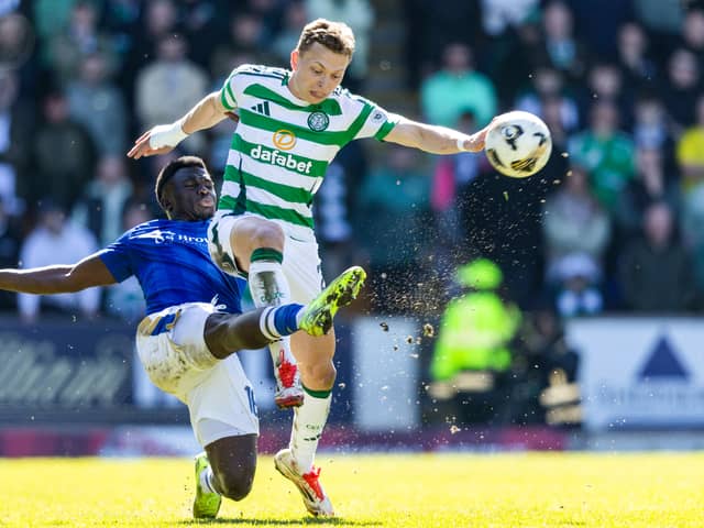 Celtic's Alistair Johnston (R) and St Johnstone's Benjamin Kimpioka in action during St Johnstone's 1-0 win over Celtic at McDiarmid Park earlier this month. Cr: SNS Group.