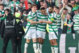 Adam Idah of Celtic celebrates scoring his team's second goal with teammate Arne Engels and Cameron Carter-Vickers during the Scottish Gas Scottish Cup Quarter-Final match between Celtic and Hibernian at Celtic Park on March 09, 2025 in Glasgow, Scotland. (Photo by Ian MacNicol/Getty Images)