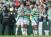 Adam Idah of Celtic celebrates scoring his team's second goal with teammate Arne Engels and Cameron Carter-Vickers during the Scottish Gas Scottish Cup Quarter-Final match between Celtic and Hibernian at Celtic Park on March 09, 2025 in Glasgow, Scotland. (Photo by Ian MacNicol/Getty Images)