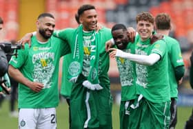 Cameron Carter-Vickers, Auston Trusty, Jeffrey Schlupp and Arne Engels of Celtic are seen celebrating the club's title triumph