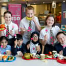 Tinto Primary School pupils Grace MacIver, Jamie Turner and Phoebe Holmes and at the front, Zahra Ahmed, Ibrahim Hussain, Lava Ibrahim and Tyler McLaren.