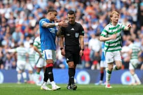 James Tavernier of Rangers speaks to referee, Nick Walsh 