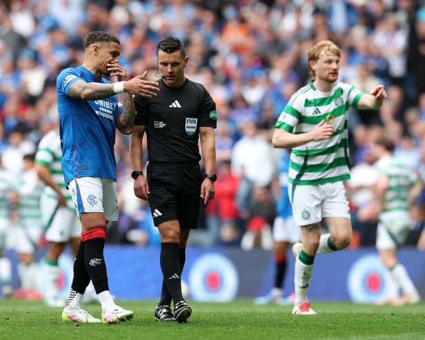James Tavernier of Rangers speaks to referee, Nick Walsh 