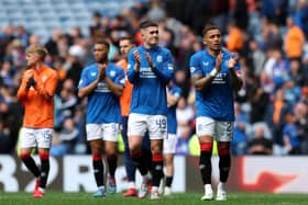 Bailey Rice and James Tavernier of Rangers FC applaud the fans following the William Hill Premiership match between Rangers FC and Celtic FC at Ibrox Stadium on May 04, 2025 in Glasgow, Scotland. (Photo by Ian MacNicol/Getty Images)