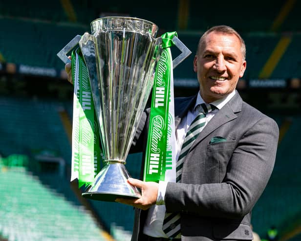 Celtic manager Brendan Rodgers with the William Hill Premiership trophy after the 1-1 draw with St Mirren. (Photo by Ross MacDonald / SNS Group)
