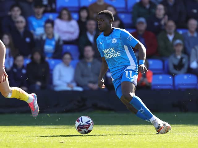Kwame Poku of Peterborough United has attracted transfer interest from Rangers and Celtic