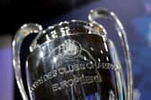A photo shows European Champion Clubs' Cup trophy displayed on set prior to the draw for the round of 16 of the 2024-2025 UEFA Champions League football tournament at the House of European Football in Nyon, on February 21, 2025. (Photo by Valentin Flauraud / AFP) (Photo by VALENTIN FLAURAUD/AFP via Getty Images)          