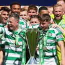 GLASGOW, SCOTLAND - MAY 17: Callum McGregor and James Forrest of Celtic lift the League trophy after the William Hill Premiership match between Celtic FC and St Mirren FC at Celtic Park on May 17, 2025 in Glasgow, Scotland. (Photo by Ian MacNicol/Getty Images)