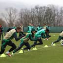  Daizen Maeda of Celtic (green hat) and his team mates take part in a training session at Lennoxtown
