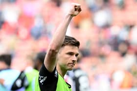 Kieran Tierney of Arsenal acknowlegdes the fans, after his final appearance in the teams 2-1 victory during the Premier League match between Southampton FC and Arsenal FC at St Mary's Stadium on May 25, 2025 in Southampton, England. (Photo by Stuart MacFarlane/Arsenal FC via Getty Images)