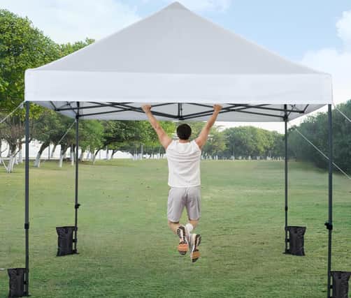 The pop-up gazebo is made of steel and designed for all weathers