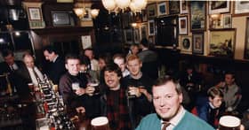 The Bow Bar manager Ian Whyte pictured with customers at the bar in 1990