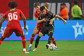 Fabio Vieira of Arsenal holds off Owen Beck of Liverpool at Lincoln Financial Field on July 31, 2024 in Philadelphia (Pic: Getty)