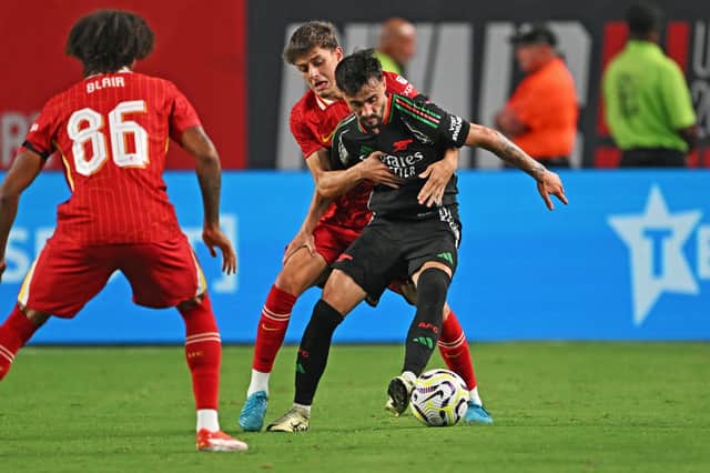 Fabio Vieira of Arsenal holds off Owen Beck of Liverpool at Lincoln Financial Field on July 31, 2024 in Philadelphia (Pic: Getty)