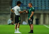 Brendan Rodgers speaks with Jota of Celtic FC