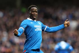 Djeidi Gassama of Rangers celebrates scoring his team's first goal during the UEFA Champions League Third Qualifying Round First Leg match between Rangers and Viktoria Plzen